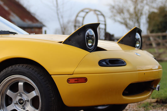 The cars behind the art